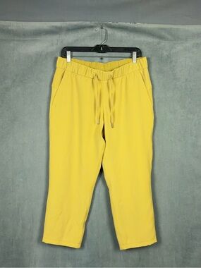 Lululemon Lululemon On the Fly Crop Woven 23" Vintage Gold Womens Size 10